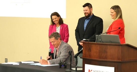 Gov. Pillen; DED Interim Director Maureen Larson; Doug Rood, vice chair of workforce for NeMAC, Katie Thurber, commissioner, NDOL