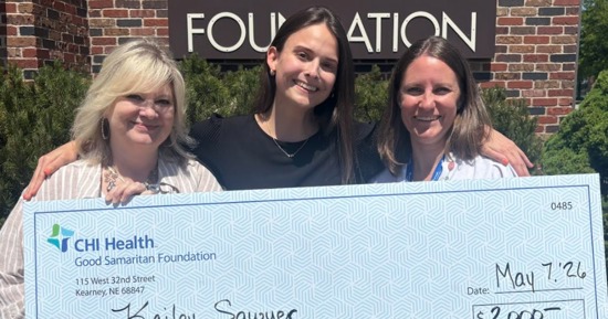  Kailey Sawyer (center) celebrates receiving $2,000 in Good Samaritan Foundation Health Care Scholarships alongside Care Management colleagues Melissa Murphy (left) and Abby Olson (right). Sawyer is among 20 students awarded a collective $18,750 in scholarships this year funded by the Foundation's generous donors.